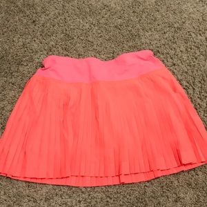 Coral size 2 lululemon skirt.